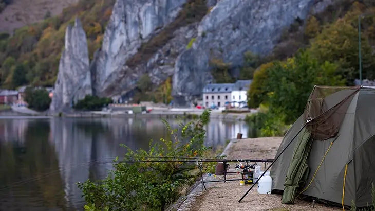 Camping tent near lake shore