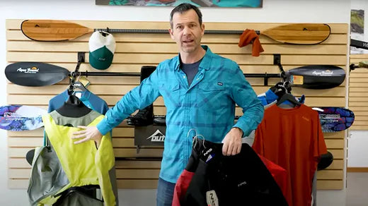 Ken Whiting showing different paddling apparel and gear
