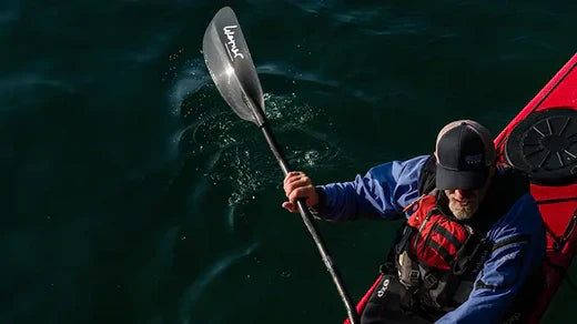 Man kayaking on the river with kayak gear