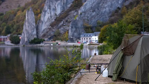 Camping tent near lake shore