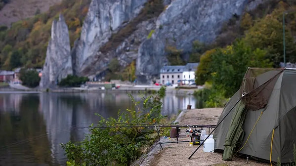 Camping tent near lake shore