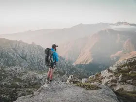 Male hiker looking out at mountain