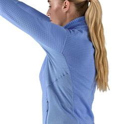 Patagonia Women's R1 Jacket in Abundant Blue on model raising her arm