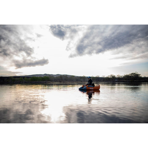 Outcast Fish Cat 4 Deluxe LCS Float Tube fishing on a lake