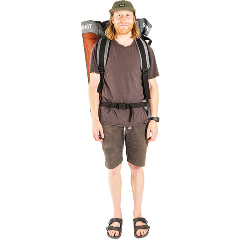 Slingshot Tracker 7' Inflatable SUP Board w/ SUPWinder in Orange lifestyle