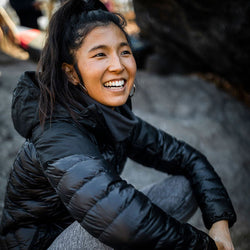 Outdoor Research Women's Helium Down Hoodie in Black lifestyle