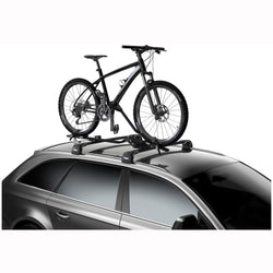 Thule Proride XT Bike Roof Rack installed on a car