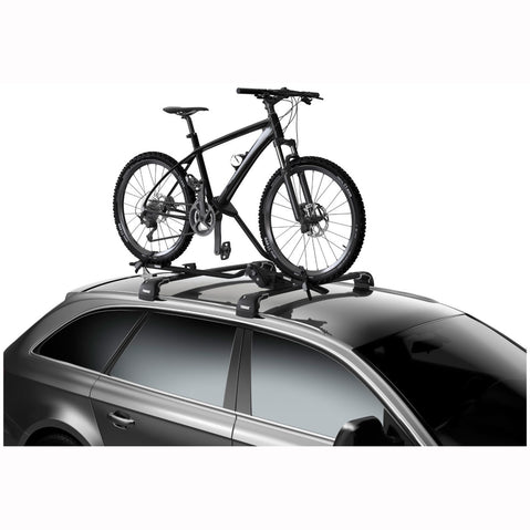 Thule Proride XT Bike Roof Rack installed on a car