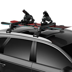 Thule SnowPack Ski/Snowboard Roof Rack loaded with snowboards
