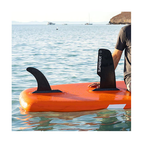 Slingshot Tracker 7' Inflatable SUP Board w/ SUPWinder in Orange lifestyle