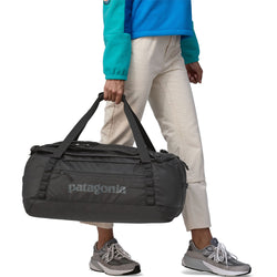 Patagonia Black Hole Duffel 55L in Black model carry
