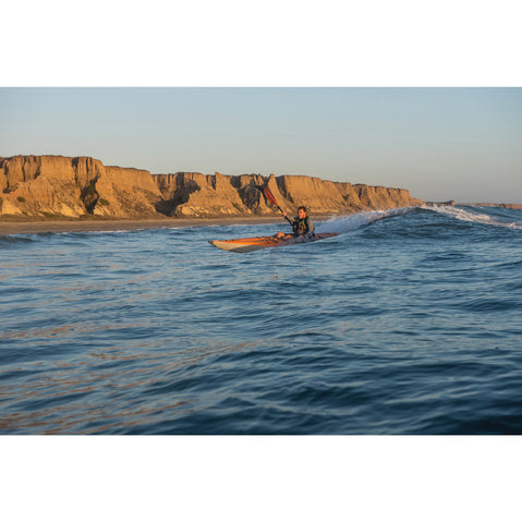 Advanced Elements AirFusion Evo Inflatable Kayak in Orange/Gray in use side view