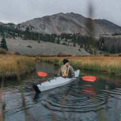 Aqua-Bound Sting Ray Fiberglass 4-Piece Kayak Paddle in Sunset Red lifestyle