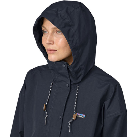 Patagonia Women's Outdoor Everyday Rain Jacket in Pitch Blue model hood