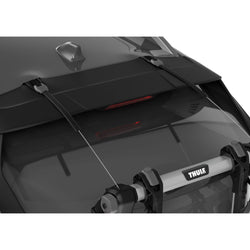 Thule OutWay Hanging 2 Bike Trunk Rack in Silver/Black installed on a car side