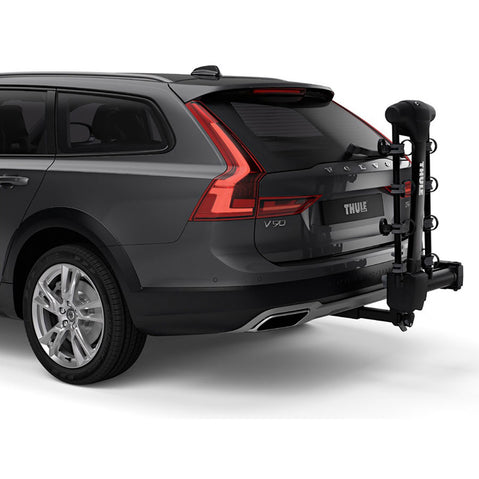 Thule Apex XT Swing 4 Bike Rack installed on a car close