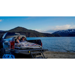 AIRE Truckbed Landing Pad Inflatable Mattress in Gray/Green in use