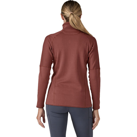 Patagonia Women's R1 Pullover Top model in dulse mauve turned away