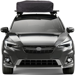 Thule Approach Roof Top Tent folded up on top of car front view