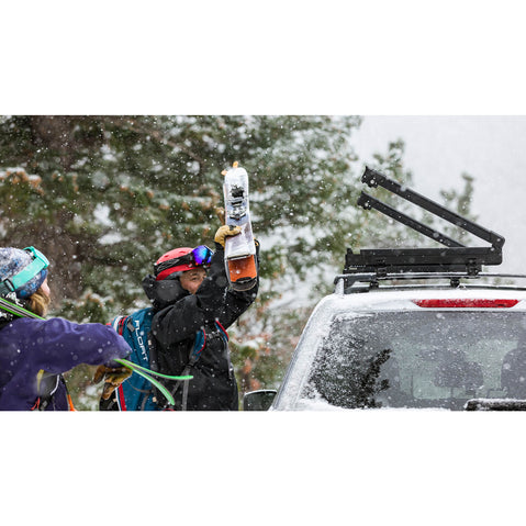 Kuat Switch 6 Ski/Snowboard Roof Rack loading skis