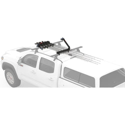 Yakima ReelDeal Rooftop Fishing Rod Carrier installed on a car back