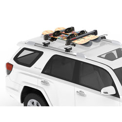 Yakima FreshTrack 6 Ski and Snowboard Carrier installed on a car side