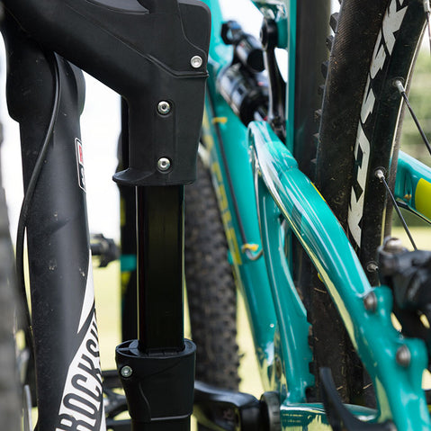 Kuat NV Base 2.0 Bike Hitch Rack in Matte Black close up detail of bike on rack