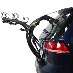 Saris Bones EX 3-Bike Trunk Rack installed on a car side