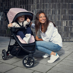 Thule Spring Stroller in Misty Rose Melange lifestyle