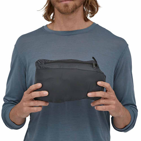 Patagonia Men's Down Sweater Vest in Black model packed