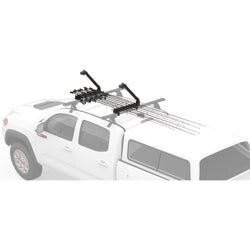 Yakima ReelDeal Rooftop Fishing Rod Carrier installed on a car side