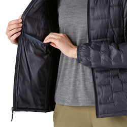 Patagonia Women's Micro Puff Hoody in Smolder Blue model pocketPatagonia Women's Micro Puff Hoody in Smolder Blue model pocket