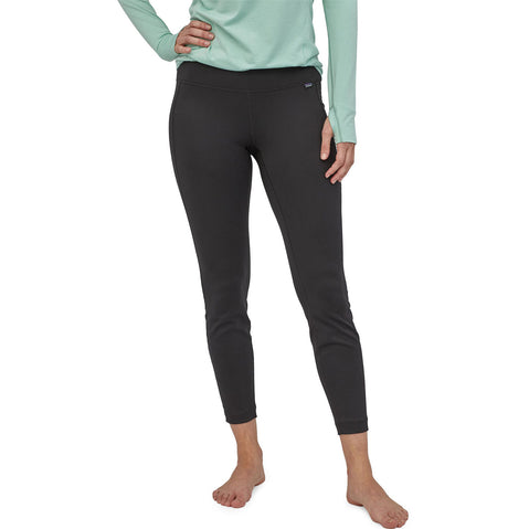 Patagonia Women's Capilene Mid Weight Bottoms in Black model view front