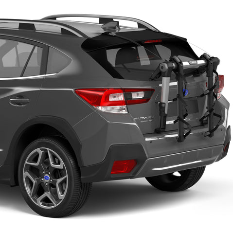 Thule OutWay Hanging 3 Bike Trunk Rack in Silver/Black installed on a car back