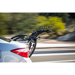 Saris Bones 3-Bike Trunk Rack installed on a car up