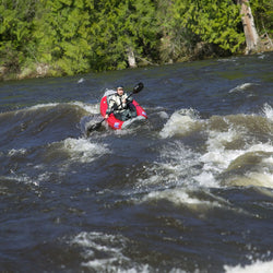 AIRE Outfitter II Inflatable Kayak with kayaker on a river