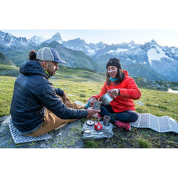 Campers using Titan Kettle outdoors