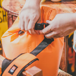 Closeup of IceMule Classic Cooler strap and buckle closure