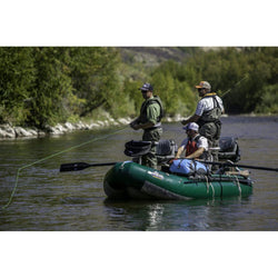 Outcast PAC 1300 Self-Bailing Raft  fishing on a river