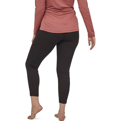 Patagonia Women's Capilene Mid Weight Bottoms in Black model view back
