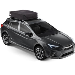 Thule Approach Roof Top Tent folded up on top of car angle view