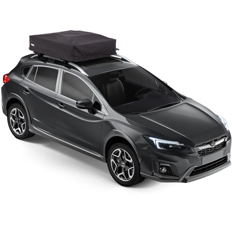 Thule Approach Roof Top Tent folded up on top of car angle view