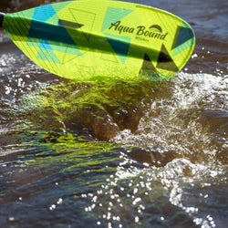 Aqua Bound Whiskey Fiberglass Straight Shaft Posi-Lok 2-Piece Kayak Paddle in Geo Punch paddle in water