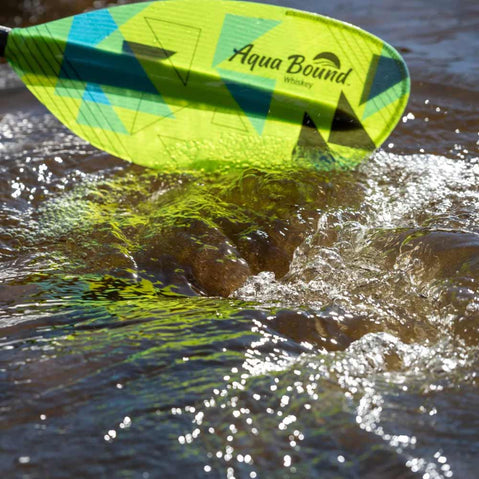 Aqua Bound Whiskey Fiberglass Straight Shaft Posi-Lok 2-Piece Kayak Paddle in Geo Punch paddle in water