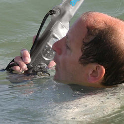 Aquapac VHF Radio Classic Dry Case swimmer talking on radio