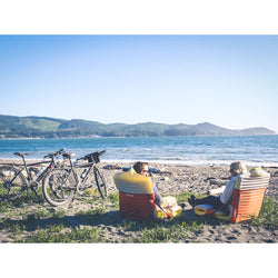 Therm-a-Rest Trekker Chair Kit in Tomato lifestyle