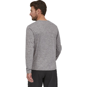 Patagonia Men's Capilene Cool Daily Long Sleeve Shirt in Feather Grey model back