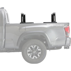 Yakima OutPost HD Truck Bed Rack installed on a car side