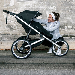 Thule Glide 2 Single Stroller in Black lifestyle