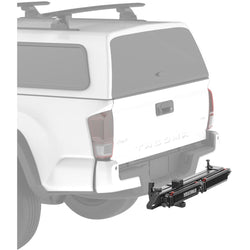 Yakima Exo SwingBase System Foundation installed on a car folded